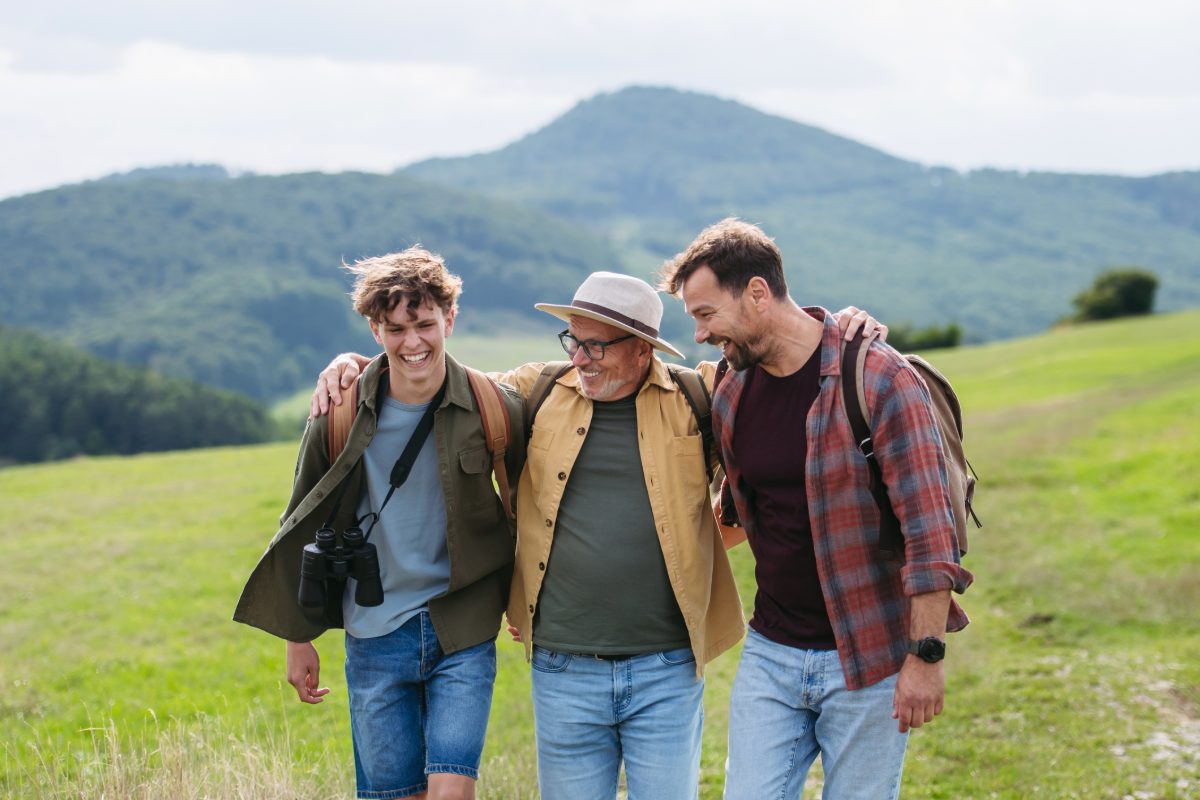 Three generations of a family walking together